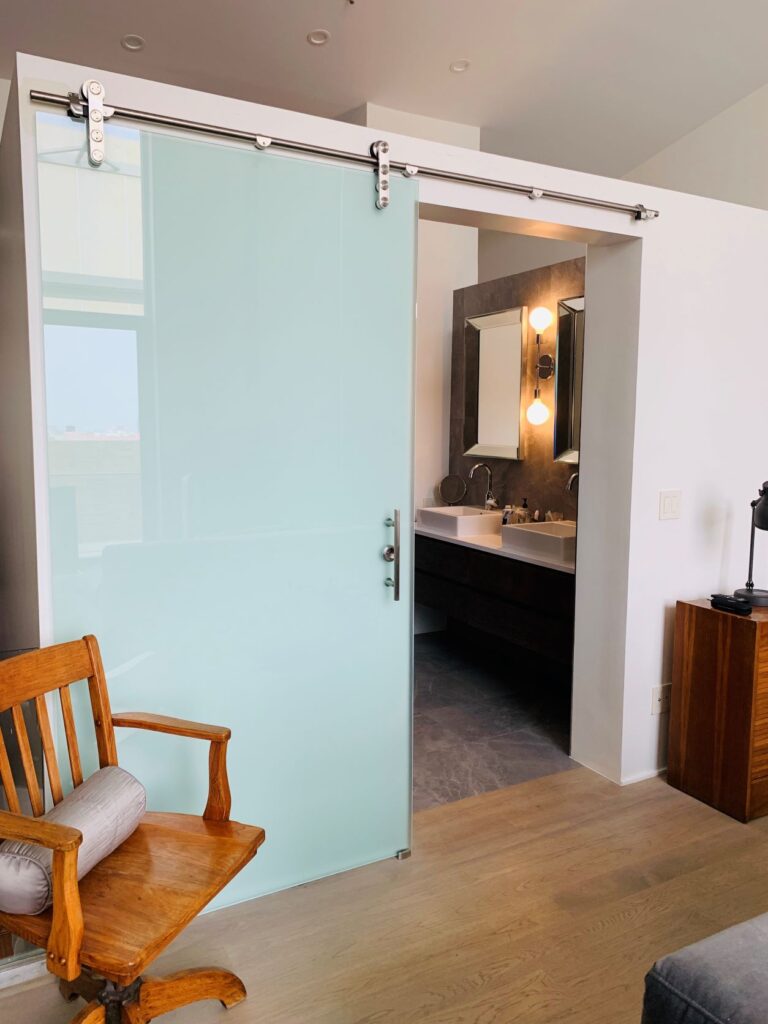 Elegant Frameless Glass Interior Doors | KNR Sliding Doors